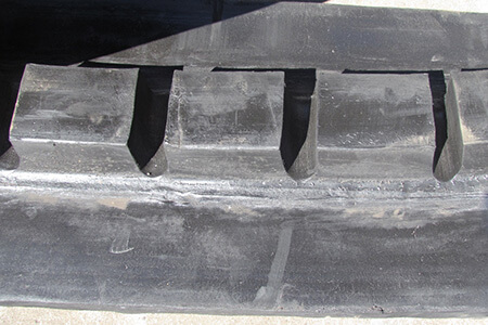 Guide blocks on a track reconditioned by Big Tyre